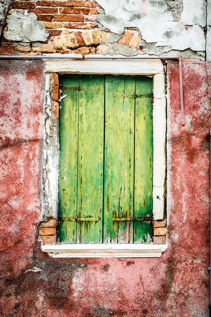 Worn green shutter